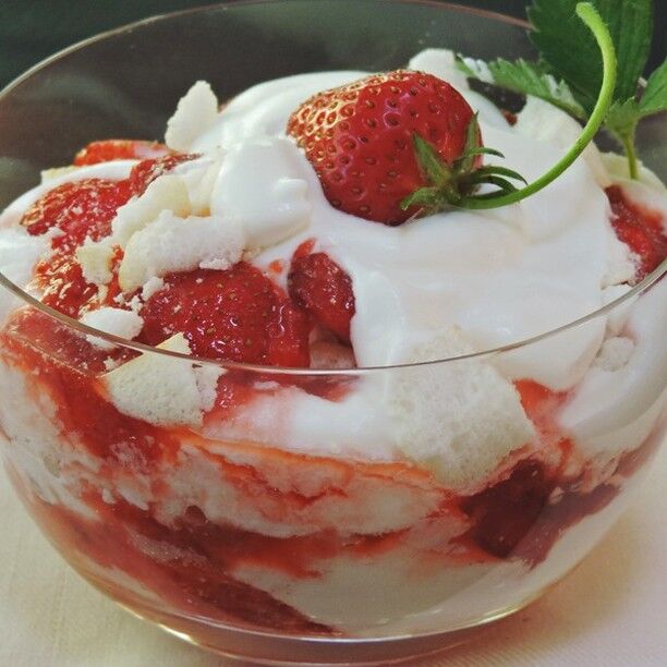 Strawberries, crunchy meringue, and whipped cream! Yum!